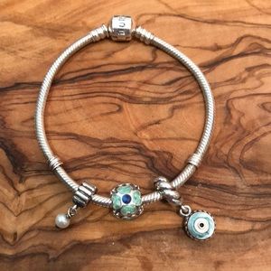 Pandora 6in. Silver bracelet and 3 charms